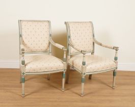 A PAIR OF LOUIS XVI STYLE POLYCHROME PAINTED OPEN ARMCHAIRS (2)