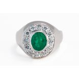 AN EMERALD AND DIAMOND RING (2)