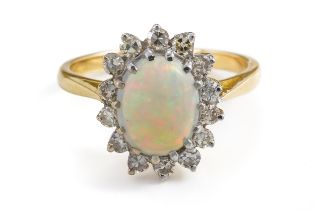 AN OPAL AND DIAMOND CLUSTER RING