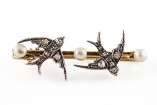 A DIAMOND AND PEARL SWALLOW BROOCH