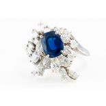 A SAPPHIRE AND DIAMOND RING