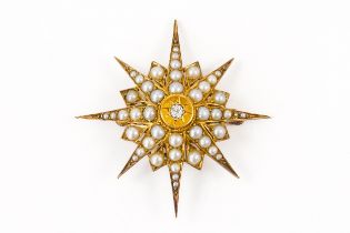 A PEARL AND DIAMOND STAR BROOCH