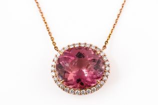 A PINK TOURMALINE AND DIAMOND PENDANT NECKLACE, BOXED (3)