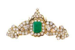 AN EMERALD AND DIAMOND BROOCH