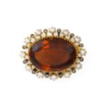 A CITRINE AND PEARL BROOCH