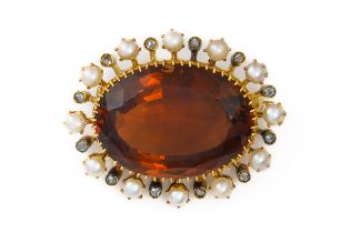 A CITRINE AND PEARL BROOCH