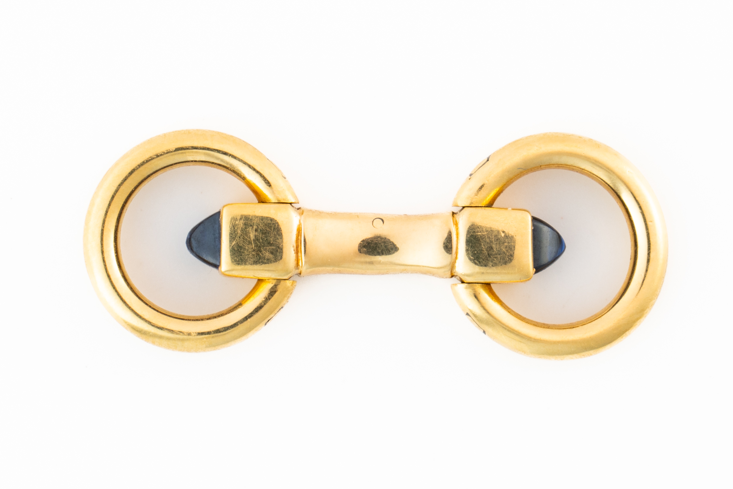 A CARTIER LONDON GOLD AND SAPPHIRE SINGLE CUFFLINK