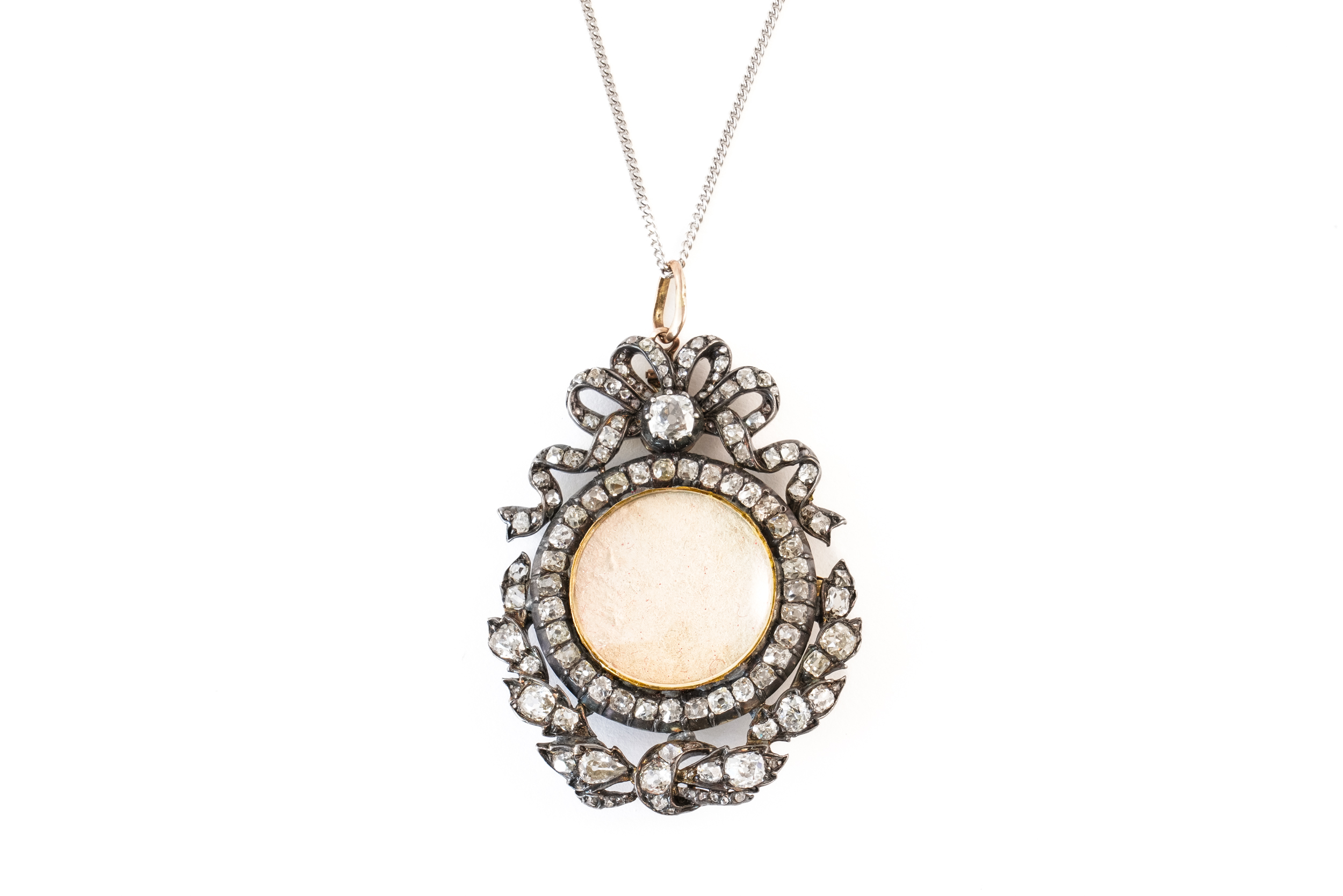 A DIAMOND LOCKET PENDANT BROOCH