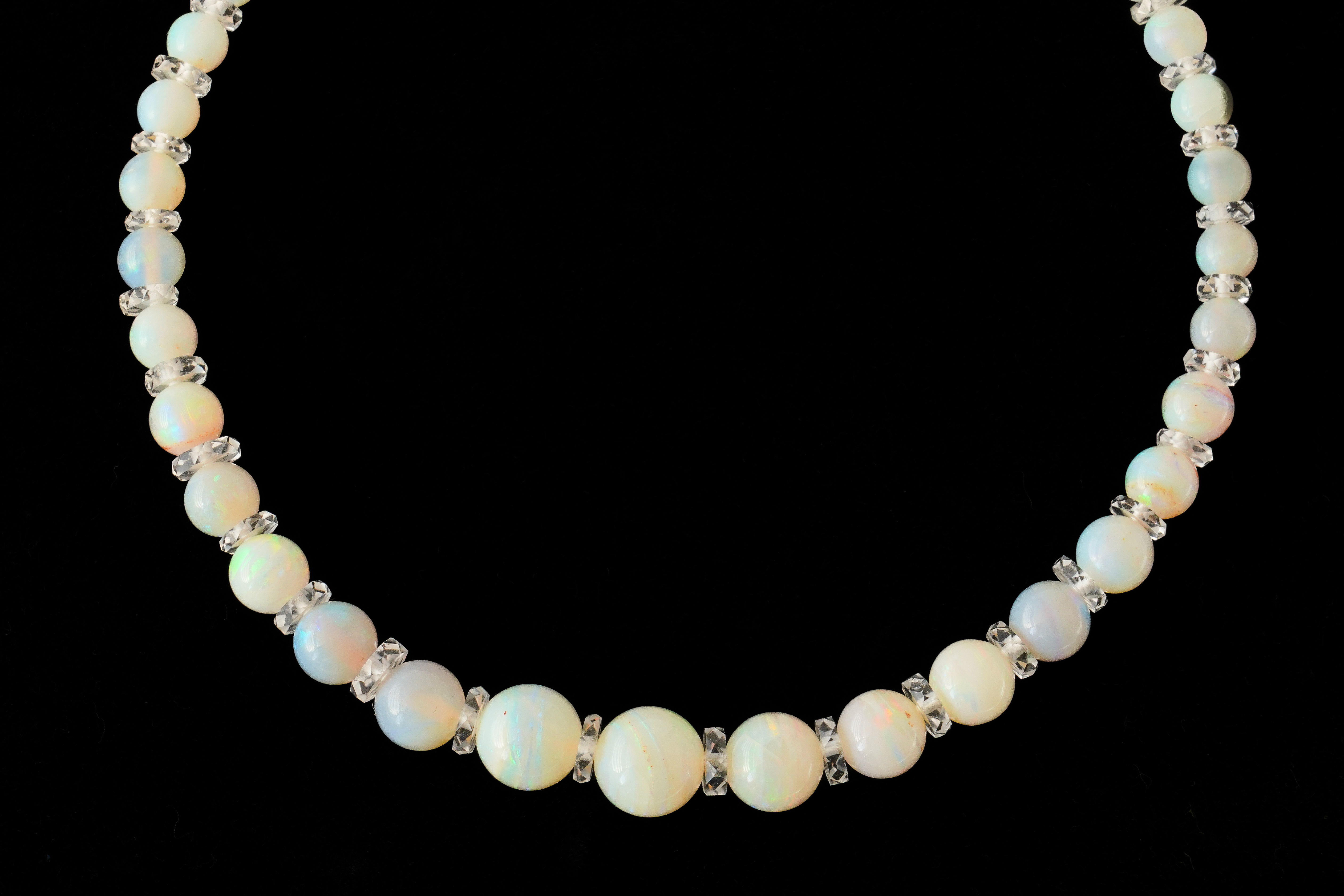 AN OPAL BEAD AND ROCK CRYSTAL NECKLACE