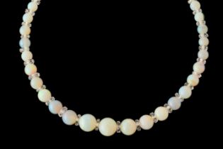 AN OPAL BEAD AND ROCK CRYSTAL NECKLACE