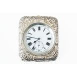 A LATE VICTORIAN SILVER CASED TRAVELLING CLOCK