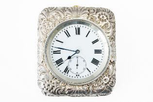 A LATE VICTORIAN SILVER CASED TRAVELLING CLOCK