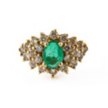 AN EMERALD AND DIAMOND RING, BOXED