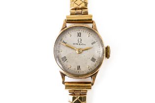 AN OMEGA 9CT GOLD CIRCULAR CASED LADY'S WRISTWATCH