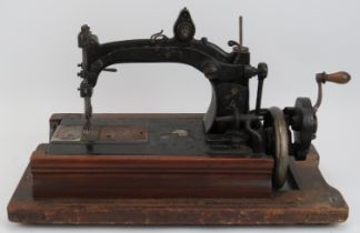A Victorian lever arm sewing machine, mid 19th century. Manufactured to be hired out to home