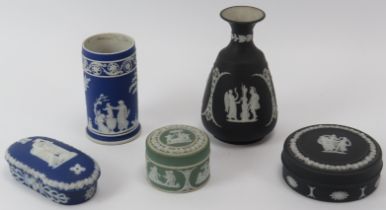 A group of five Wedgwood jasperware items, 19th/early 20th century. Comprising a black basalt