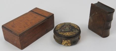 A tortoiseshell snuff box, a treen snuff box of book form and a tea caddy box, 19th century. Treen