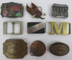 A group of vintage British and American metal belt buckles. (9 items) 9.8 cm largest width.