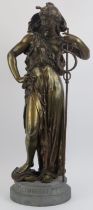 A large bronzed pewter statue of a neoclassical female figure entitled ‘Commerce’, early 20th