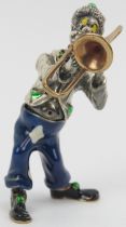 An Italian Sorini enamelled and parcel gilt silver figure of a clown with trombone, 20th century.