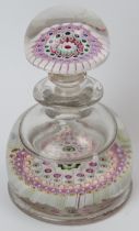 An English glass millefiori cane glass inkwell paperweight with stopper, mid 19th century. 15.8 cm