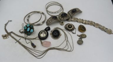 A collection of mainly silver jewellery to include an onyx three stone silver panelled bracelet,