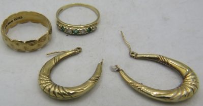A pair of 9ct yellow gold hoop earrings, a 9ct gold wedding ring and a 9ct gold ring set with