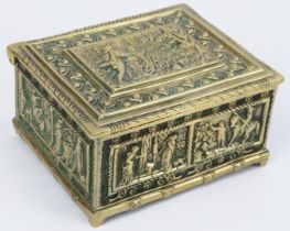 A cast brass trinket jewellery box, 19th century. Decorated in shallow relief with figural panels to