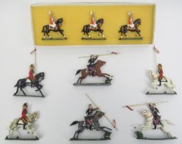 A group of vintage enamel painted lead toy cavalry soldier figures. (9 items) 12 cm tallest