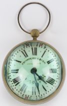 A maritime brass and magnified green glass bullseye ball clock, 20th century. The spherical case