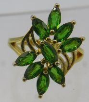Russian diopside ring size O, overall 22mm x 12mm. Nine marquise cut stones of good cut, colour