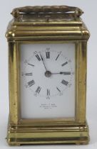 A brass carriage clock retailed by West & Son Dublin, late 19th century. 12.7 cm height. Condition