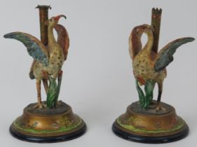 A rare pair of Victorian English gilt and enamel painted plated silver candle taperstick holders,