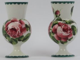 A pair of Wemyss vases, early 20th century. Of thistle form, decorated with pink cabbage roses and