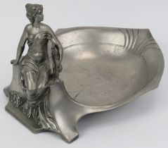 An Art Nouveau pewter figural bowl, early 20th century. Struck with an angel symbol beside letters
