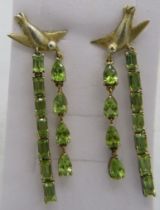 Peridot earrings, post back, emerald & pear cut stones, 50mm length approx. 14k yellow gold