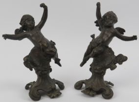 A matched pair of bronze cherub and fairy figurines, 19th century. (2 items) 17 cm height. Condition