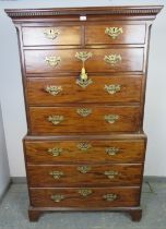 An 18th century mahogany chest on chest of good colour, having dentil cornice above eight