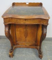 A Victorian burr walnut Davenport, having ¾ gallery, the rising lid revealing a sycamore lined