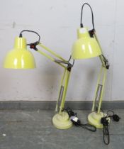 A pair of vintage angle-poise desk lamps, in cream enamel. H80cm W38cm D17cm (approx). Condition