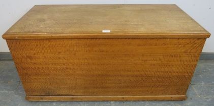 An antique satin birch flat topped trunk/blanket box, having an oak lined interior with ebony strung