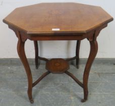 An Edwardian mahogany octagonal table, having marquetry inlay and strung with boxwood, on cabriole