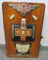 A vintage German ‘Beromat’ one-armed bandit penny slot machine, within a walnut case. Includes