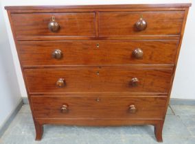 A George III mahogany straight front chest, the crossbanded top with reeded edge, above two short