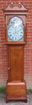 A 19th century walnut cased 8-day striking longcase clock, the hood having a broken swan-neck