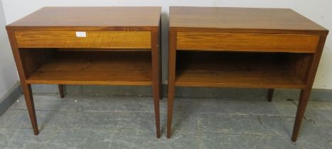 A pair of mid-century tropical hardwood and teak side tables by Alfred Cox, each housing one long