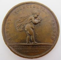 A bronze Royal Human Society lifesaving award medallion. Obverse: Depicting an infant facing right