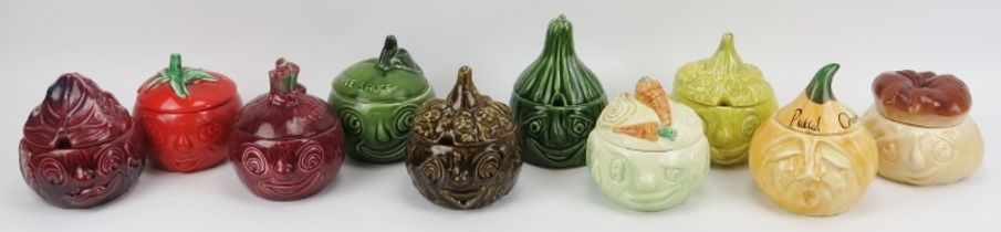 A group of ten novelty Sylvac ceramic fruit and vegetable caricature condiment storage jars and