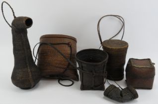 A group of six Indonesian woven rattan baskets and containers. (6 items) 36 cm tallest height.