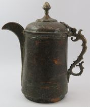 An Indo-Persian metalwork lidded decanter jug with embossed decoration, 19th century. With a